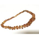 A necklace with irregular shaped graduating Amber.