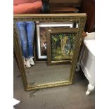 A rectangular gilt framed modern mirror measuring approximately 73cm x 103cm