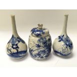 A pair of Japanese blue and white bud vases and a