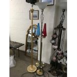 Three standard lamps including heavy simulated gold metal column on base and a vintage lamp with