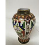 A Japanese Noritaki vase decorated with panels of