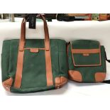 Two green and brown leather Simpson bags. One is a