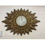 A 1930s Smiths Electric starburst wall clock. 67 x
