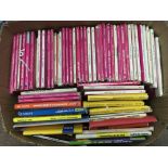 A box of mainly vintage Ordnance Survey maps.