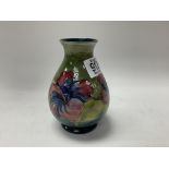 A small Moorcoft pottery pansy design vase. 14cm.