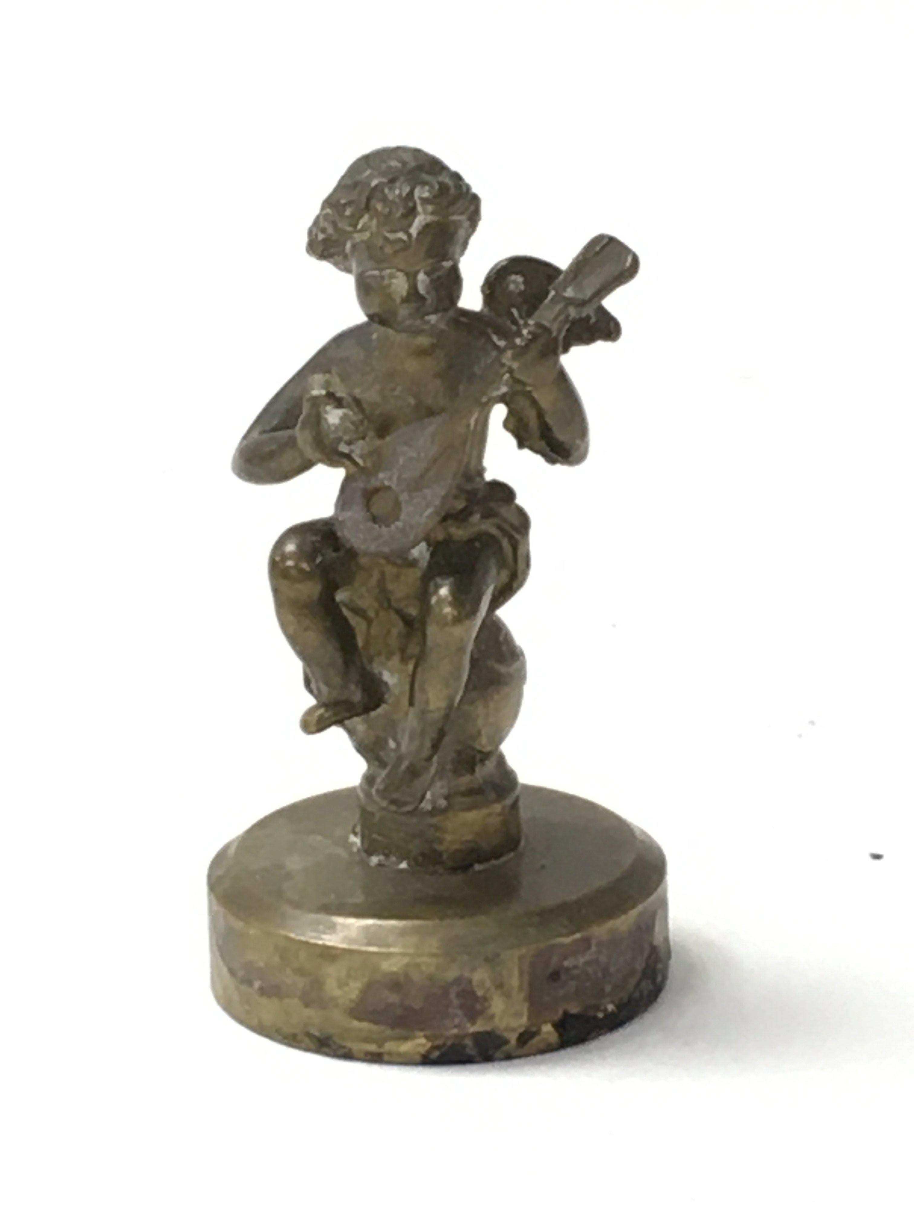 A set of 6 brass cherubs playing various musical i - Image 3 of 7
