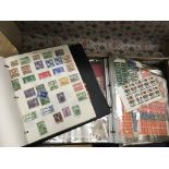 A suitcase containing albums of World Stamps vario