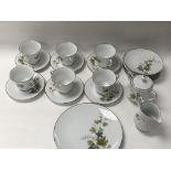 An RC Noritake porcelain tea set. 6 tea cups, 6 sa