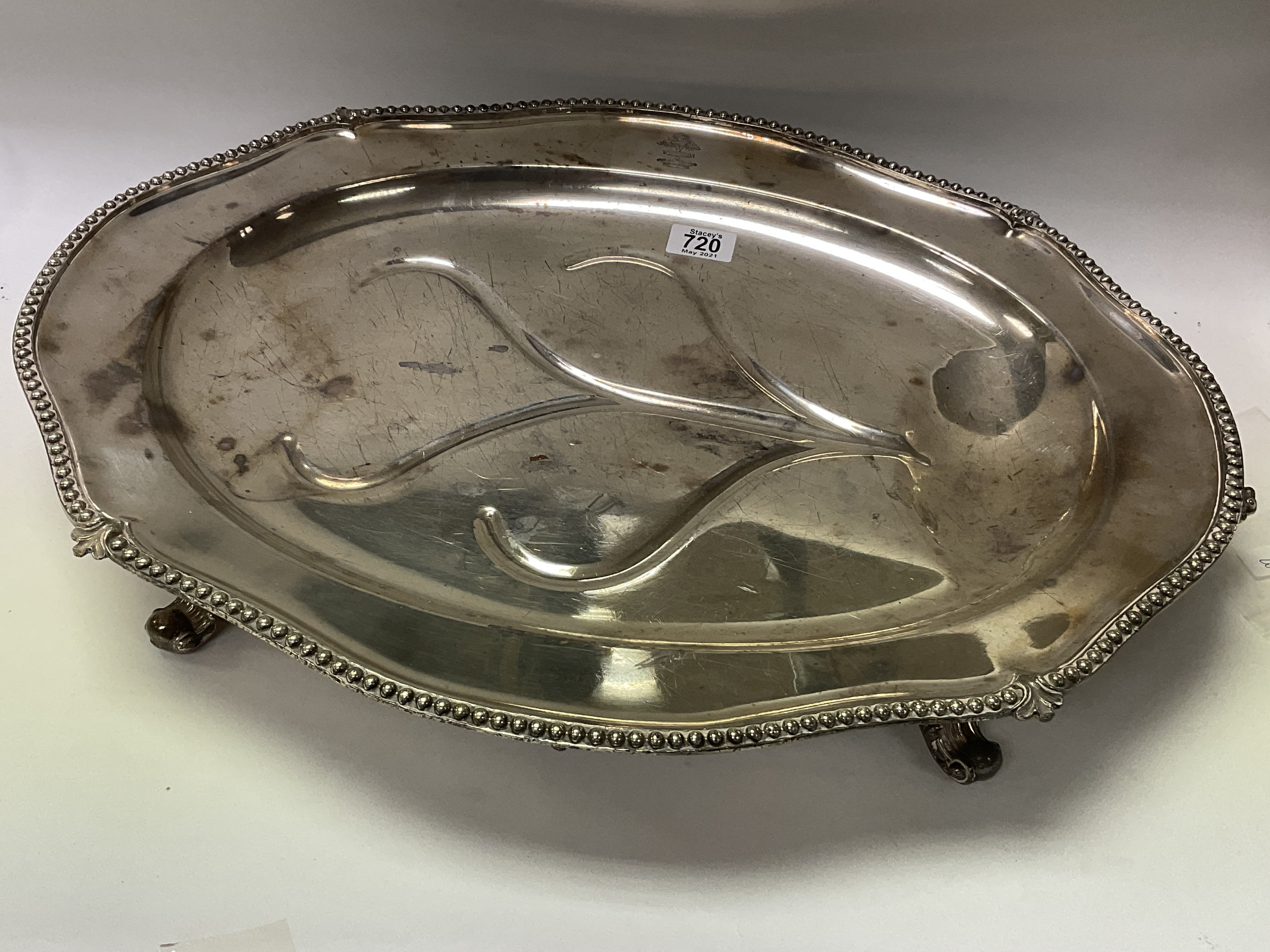 A large silver plated meat tray with 3 graduated s