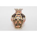 A Royal Worcester 1915 miniature vase, 8cm height