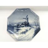 A blue and white Delft type dish of octagonal form