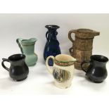A collection of six jugs, varying ages and designs