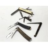 A collection of pocket tools including: A rare 19t