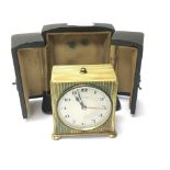 A 1930s cased Zenith Swiss made gilt metal traveli