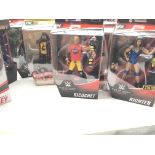 A Collection of WWE Figures including the Rock. Ri