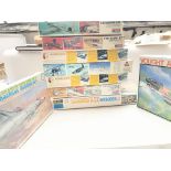 A box containing various Aircraft model kits inclu