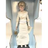 A Franklin mint Princess of Wales Porcelain doll.