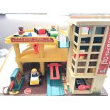 A Boxed Fisher Price Action Garage.