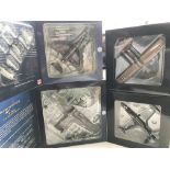 A collection of 4 boxed military aircraft includin