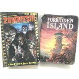 A Boxed Twilight Creations Zombies Board Game and a Forbidden Island Game boxed.