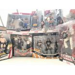 A Collection of Boxed/Carded WWE Figures including