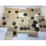 A collection of various ancient coins that are mos