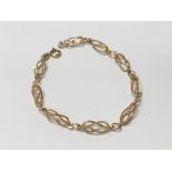 A 9 carat gold open link bracelet weighing approxi