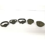 A lot of five roman rings. One looks to be A Byzan