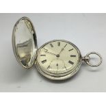 A silver cased hunter pocket watch with an enamel