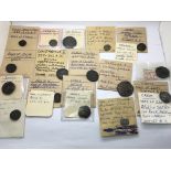 A collection of ancient Roman and Greek coins as p