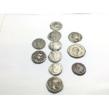 A collection of Ancient Roman coins some silver Ro