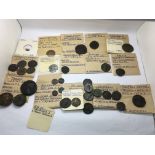 A collection of ancient Roman coins as pictured wi