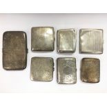 Seven silver cigarette cases, various hallmarks.