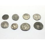 A collection of eight Ancient Roman coins includin