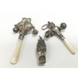 Two silver babies rattles with mother of pearl tee