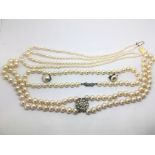 Two strands of pearls plus a double strand of pear