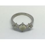 A quality 18ct white gold and opal ring, approx 3.5g and approx size L-M.