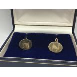 A pair of gents 9carat gold cufflinks engraved wit