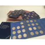 Two Great Britain blue coin albums containing silv