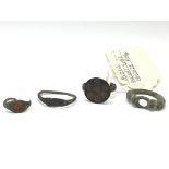 Four bronze Roman rings. This lot includes an exam