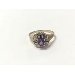 A 9 carat amethyst and diamond cluster ring, appro