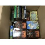 A large box of JRR Tolkien paperback books.