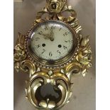 A Morden antique style gilt wall clock the circula