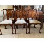 A set of 6 Queen Anne walnut fiddle backed chairs.