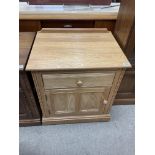 A modern blonde Ercol cutlery cabinet. 64 x 49 x 7