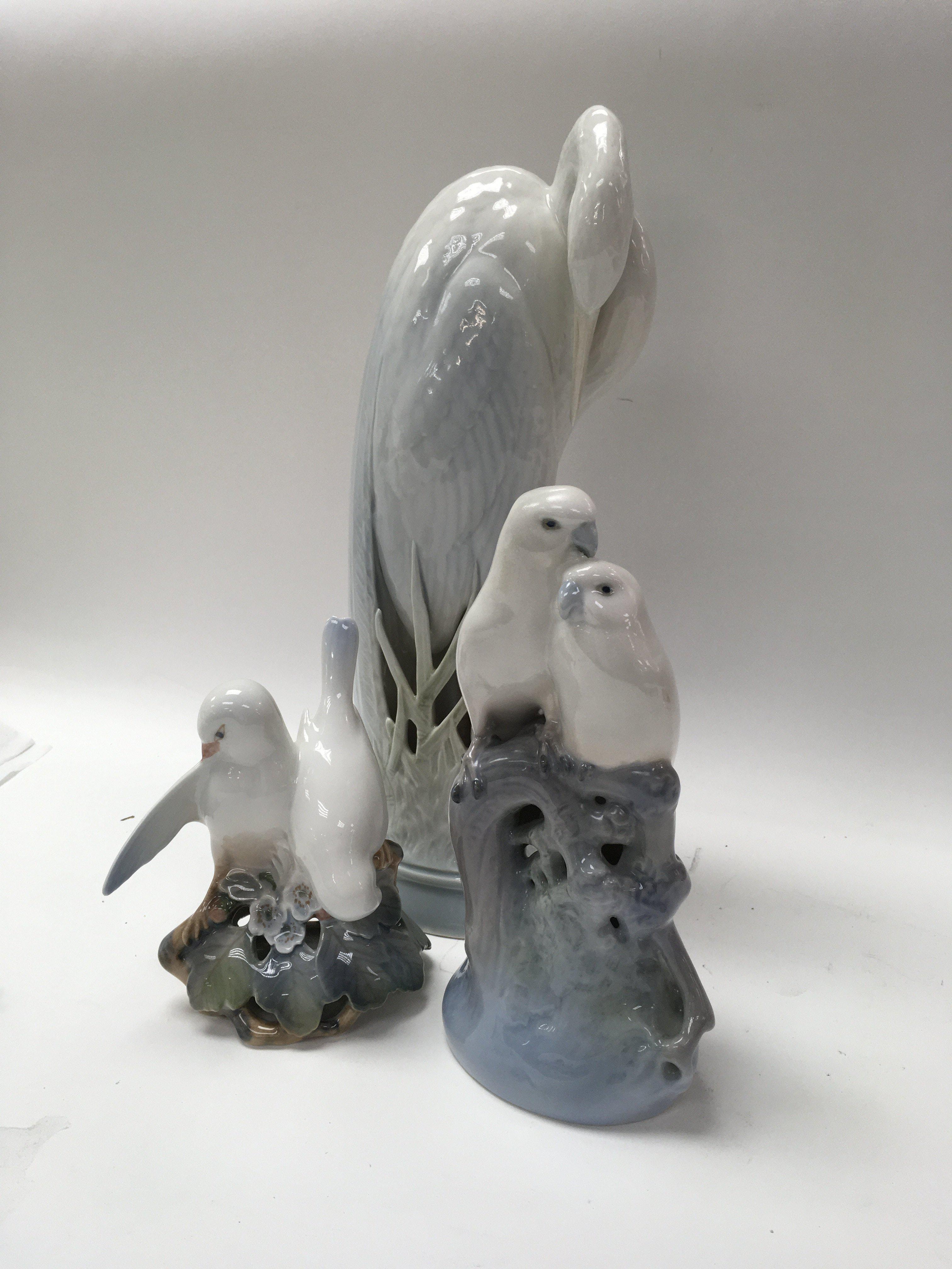 A Royal Copenhagen figure of a stork and two group