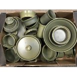 A box containing a collection of green glazed Wedgwood dinnerware