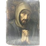 An oil painting on board of a medieval gentleman c