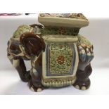 A ceramic elephant seat, approx height 43cm.