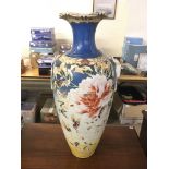 A large Satsuma vase decorated with birds and foli